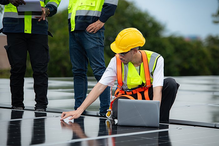 group engineer technician inspects solar panel installation test operation