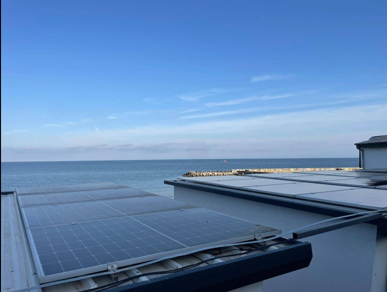 Residential rooftop solar panels after professional cleaning